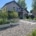 Voortuin met alpengrind, Schellevis staptegels en lavendelborder bij nieuwbouwwoning